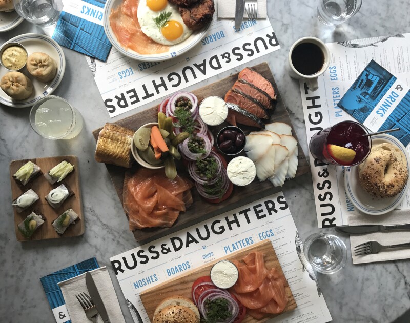 At “appetizing store” Russ & Daughters, you can pick up some of the best bagels in town schmeared or loaded high with exactly what you and the kids want.