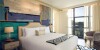 The guest rooms at the Sophy Hotel in Chicago feature hardwood floors and splashes of color throughout.