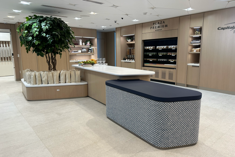 The beige reception area at Capital One Lounge, with no people