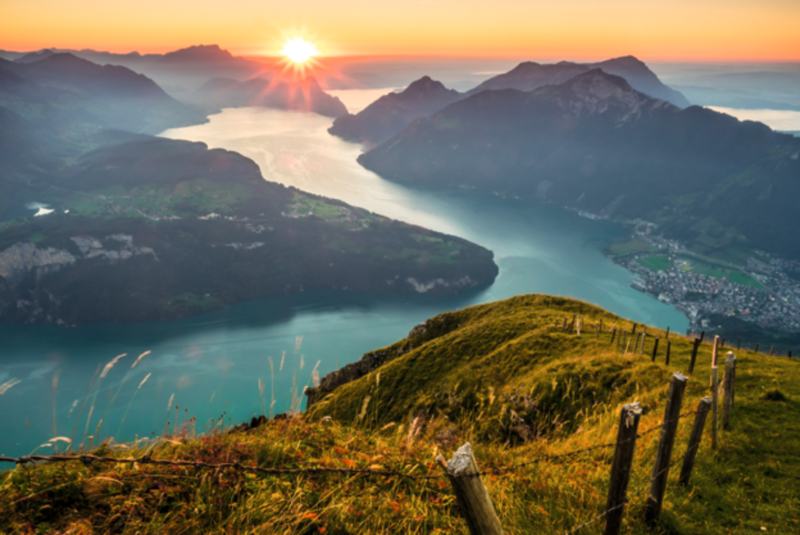 A beautiful lake in Switzerland at sunset.
