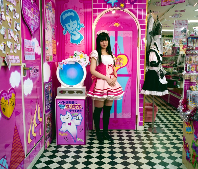 JAPAN / Tokyo / Akihabara 'Akiba' 03/2009 / Akihabara District 'Akiba' also famous for the Electric City / A shop attendant working in one of the Maid Shop where is possible to get everything for whom wants to dress like as maid , As maid outfits is one of the most popular among Cosplay the shop provide all the dresses and gadgets they need..
© Daniele Mattioli / Anzenberger