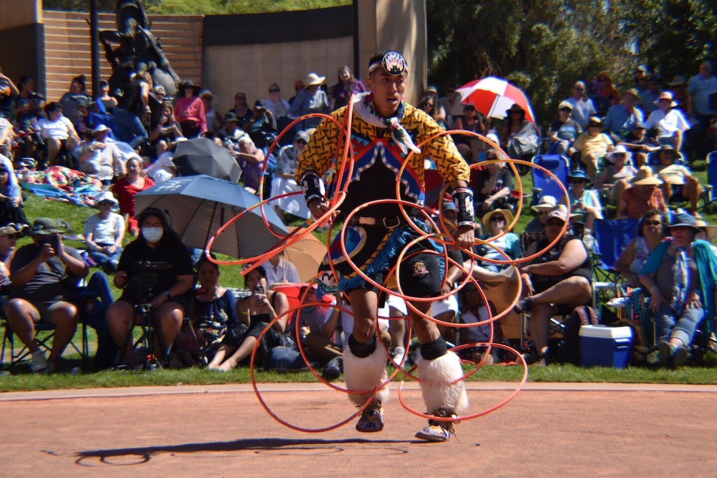 Dancer Talon Duncan forms an elaborate hoop shape during his performance.