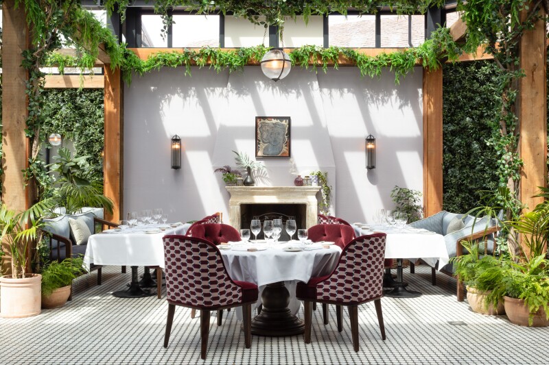 The Italian American Birnam restaurant at Gleneagles is adorned with green foliage