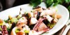 Seafood salad made of different seafood and vegetables
