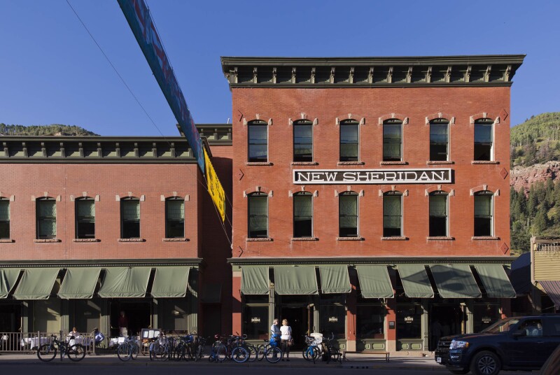 The Hotel New Sheridan features a rooftop bar with views of downtown Telluride.