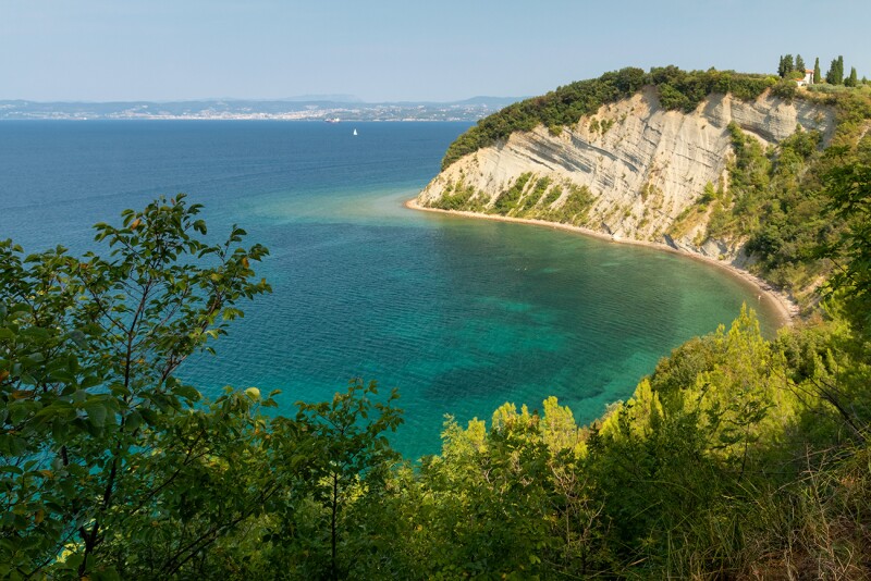 The hike down may be tough, but Moon Bay rewards visitors with a beautiful beach.