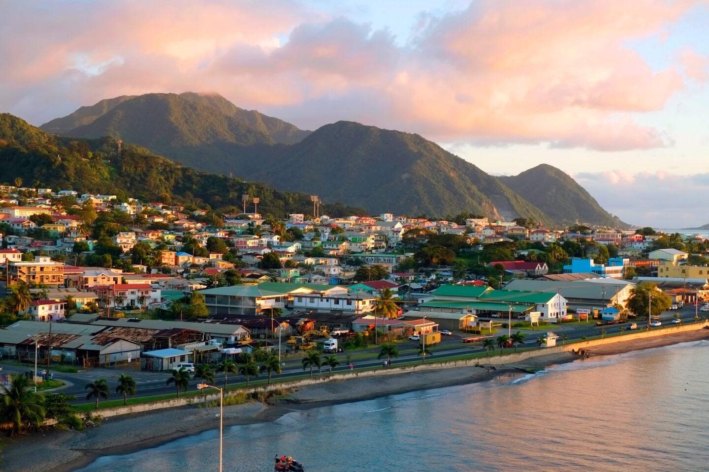 Colorful village by the mountains and waterside