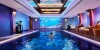 in the heart of Hong Kong’s Central district, Hong Kong’s signature Victoria Harbour, oriental heritage, Michelin star restaurant, spa, 24-hour indoor pool and fitness center