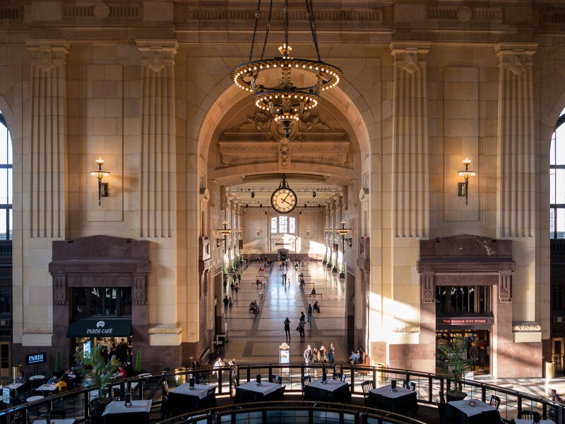 Interior of high-ceilinged Union Station, with chandelier and large round clock