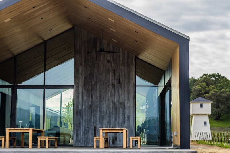Salvaged materials are the star of the show: The Silver Oak team used felled oak trees for floors and repurposed 1930s-era redwood wine tanks as exterior siding.