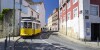 Tram line 28 crossing Lisbon¥s old town city centre in Largos do Porta do Sol.