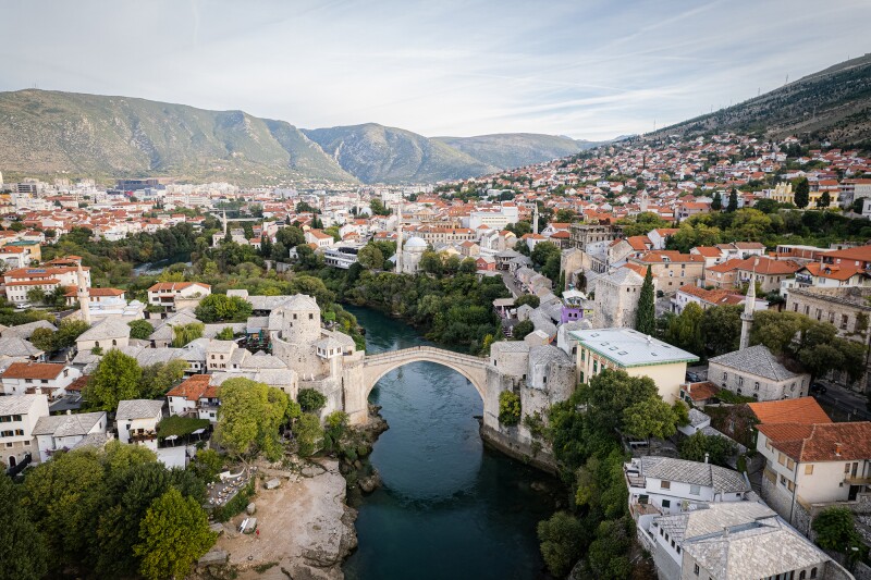 Aerial view of the Old Bridge and Old City of Mostar, with river in center