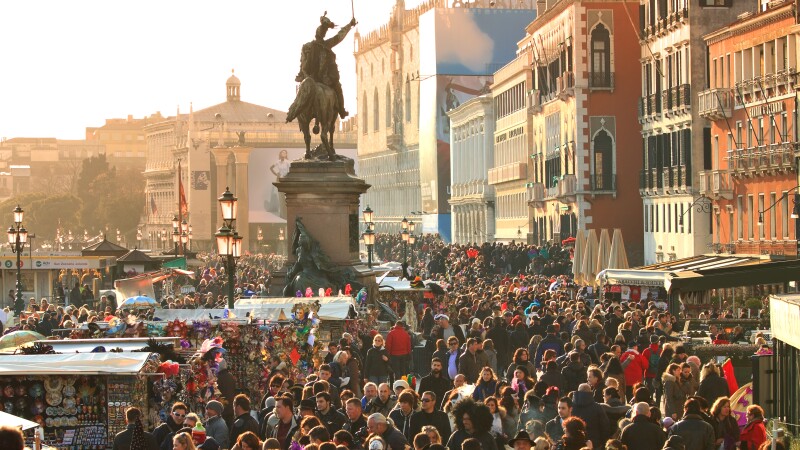 Tourists pack into the historic center of Venice near Piazza San Marco.