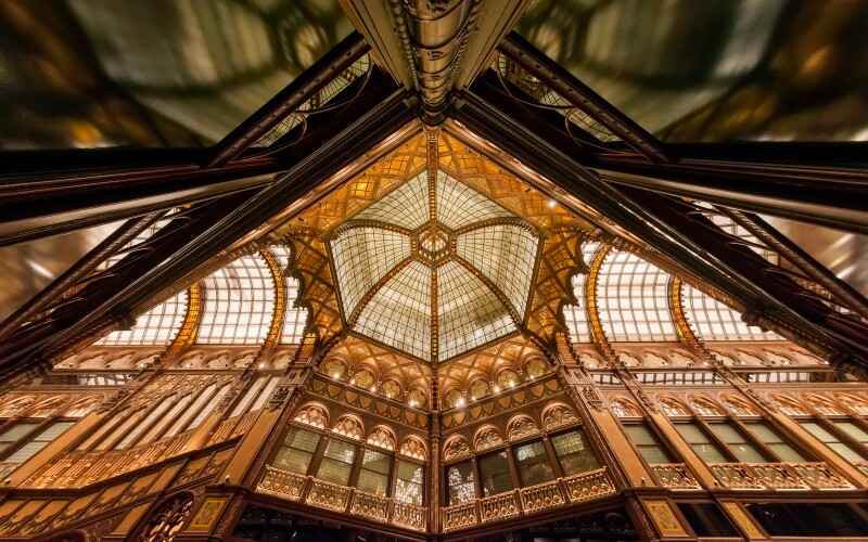 Photograph of the grand glass ceiling of the Párisi Passage of the Parisi Udvar building in Hungary